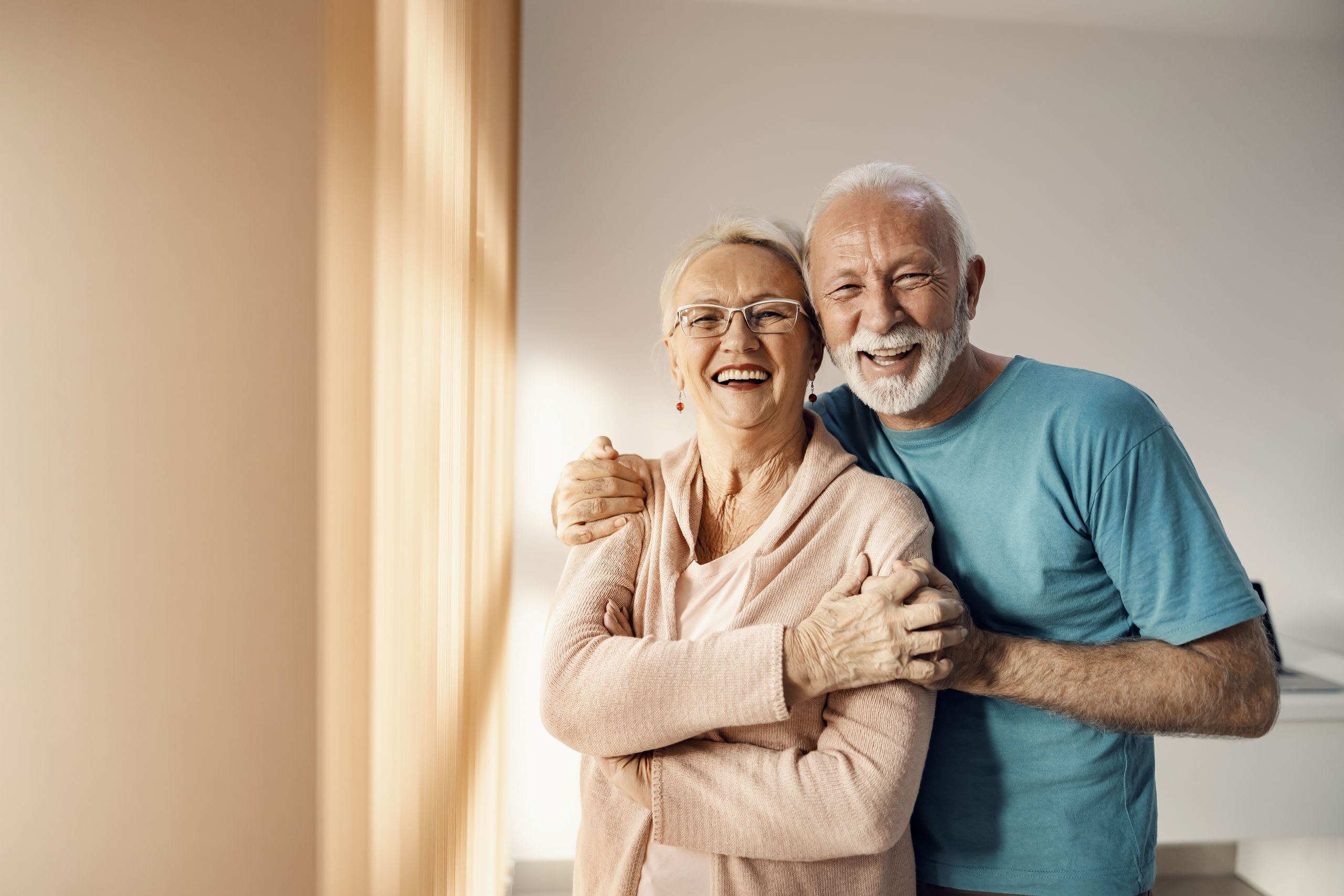 Senior couple hugging