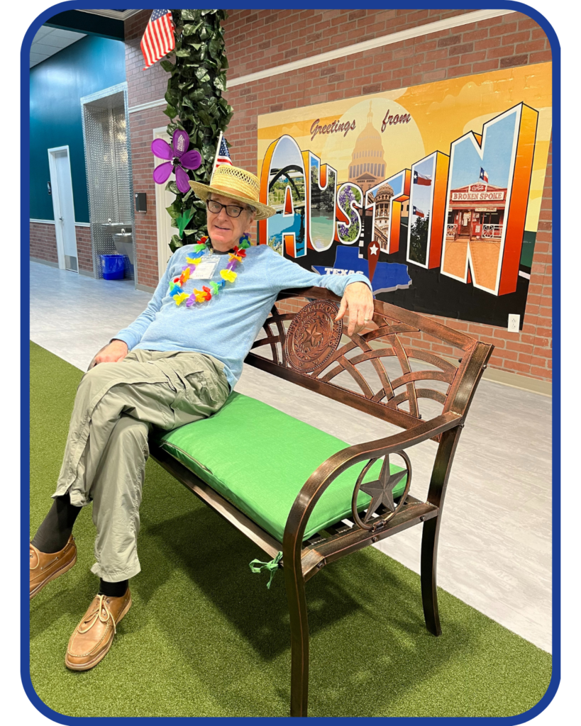 An older adult male relaxes at Town Square Northwest Austin Adult Day Care