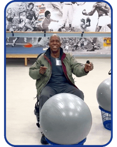 senior at town square Northwest Austin participates in seated exercises