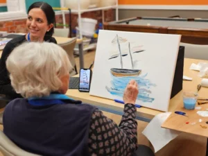 senior painting, art room at an adult day center, arts and crafts center for seniors