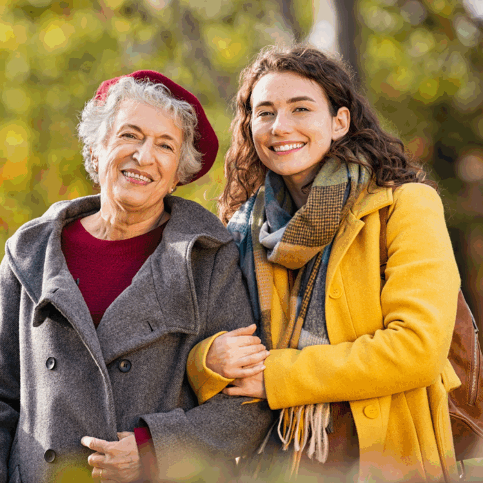senior with family member during fall